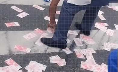 三门峡一轿车发生车祸，车内现金撒落一地遭群众争捡，有人却说好，为什么？